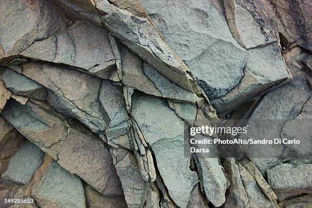 volcanic rock, close-up - vulkanisch gesteente stockfoto's en -beelden