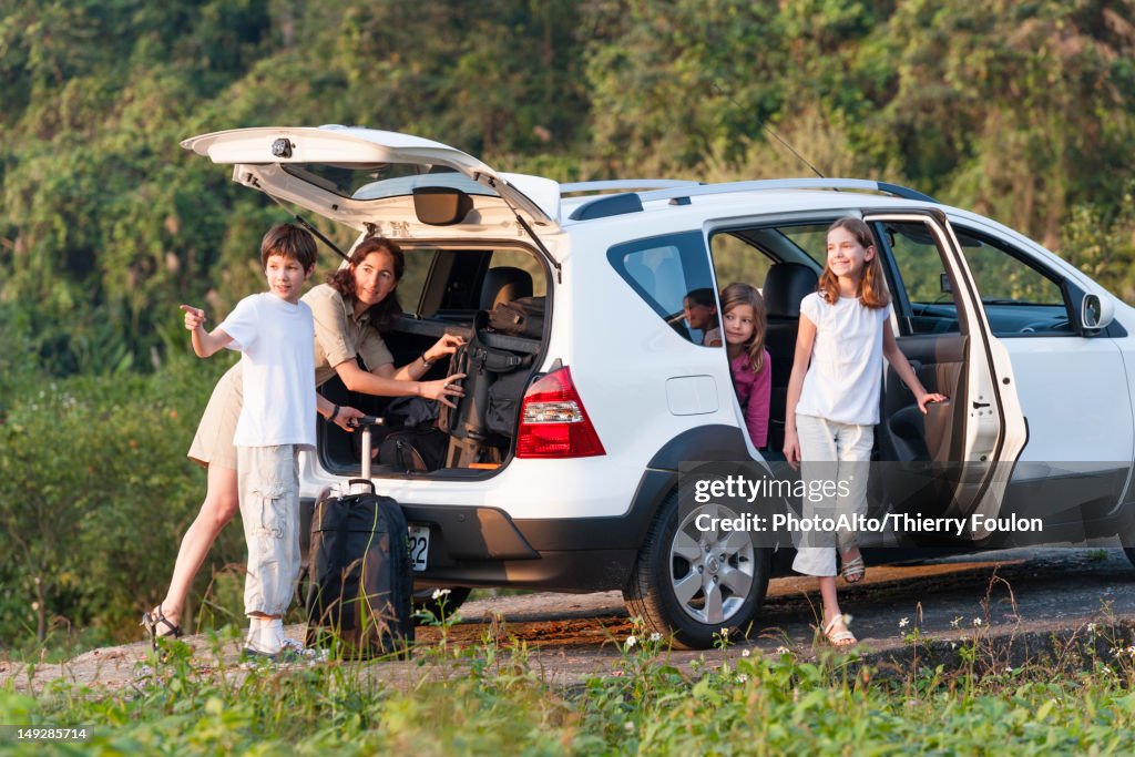 Family with SUV exploring the outdoors