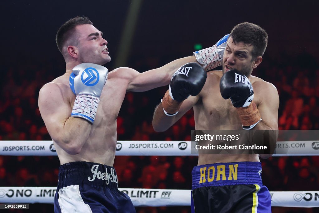 Joel Taylor exchanges punches with Ben Horn during their 68.5kg catch... News Photo Getty Images Joel Taylor exchanges punches with Ben Horn during their 68.5kg catch... News Photo Getty Images