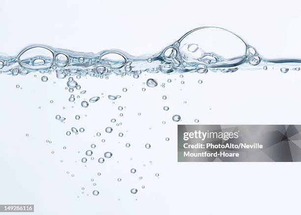 bubbles on surface of water - wasser blasen stock-fotos und bilder