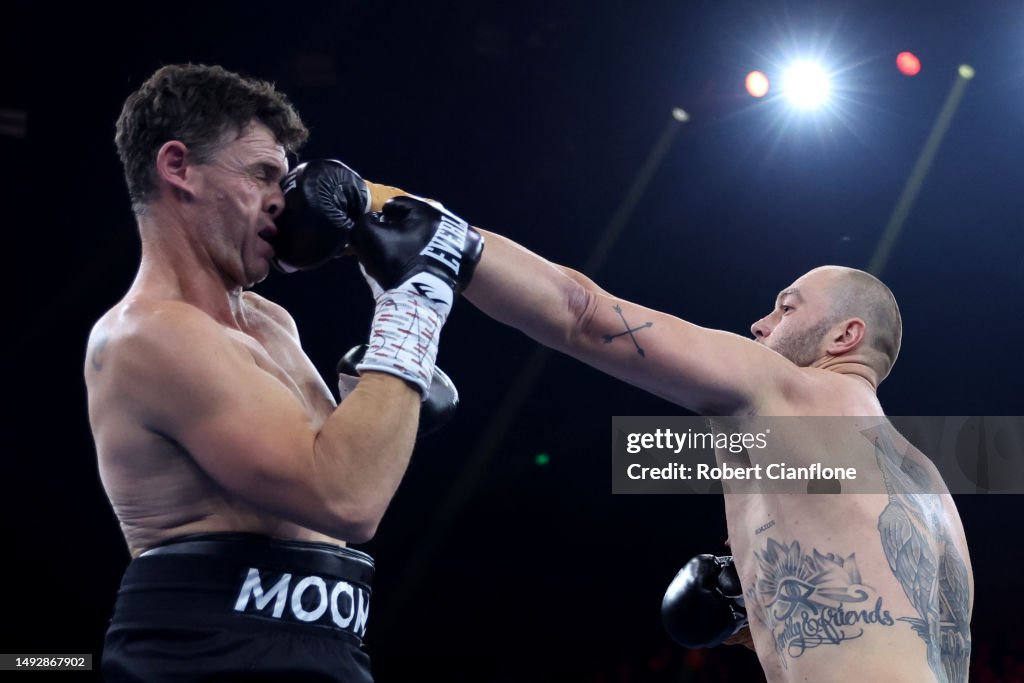 Bellchambers Object Tom Bellchambers punches Cameron Mooney during their Heavyweight bout ...