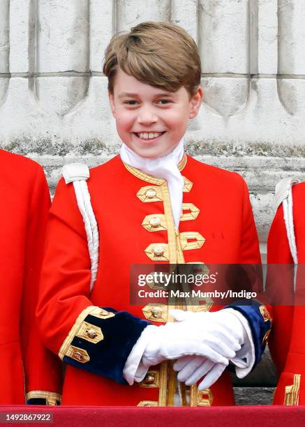 Prince George of Wales watches an RAF flypast from the balcony of Buckingham Palace following the Coronation of King Charles III & Queen Camilla at...