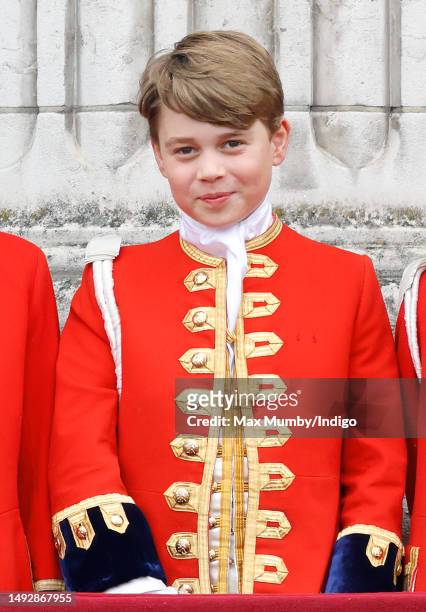 Prince George of Wales watches an RAF flypast from the balcony of Buckingham Palace following the Coronation of King Charles III & Queen Camilla at...