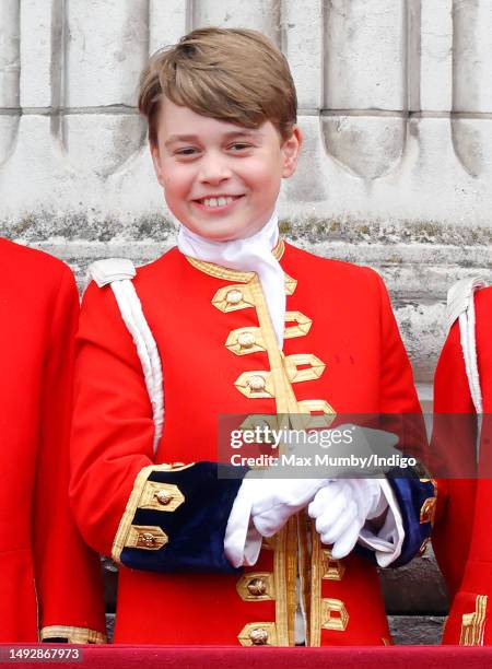 Prince George of Wales watches an RAF flypast from the balcony of Buckingham Palace following the Coronation of King Charles III & Queen Camilla at...