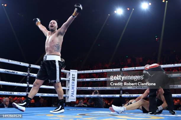 Tom Bellchambers celebrates victory after defeating Cameron Mooney during their Heavyweight bout at Margaret Court Arena on May 24, 2023 in...