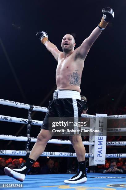 Tom Bellchambers celebrates victory after defeating Cameron Mooney during their Heavyweight bout at Margaret Court Arena on May 24, 2023 in...