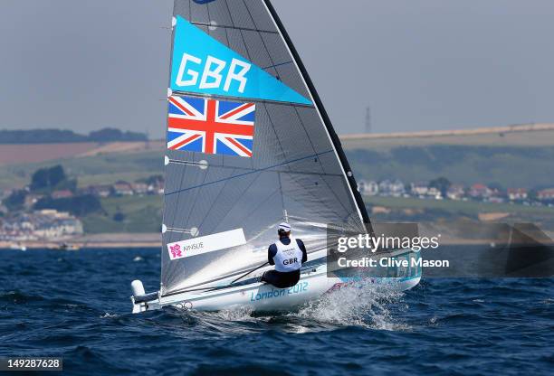 Ben Ainslie of Great Britain in action during training at the Weymouth & Portland Venue, ahead of the London 2012 Olympic Games on July 26, 2012 in...