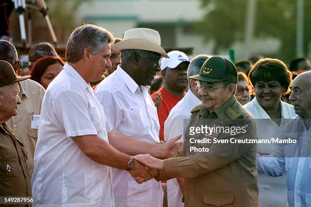 Cuban President Raul Castro greets Miguel Diaz-Canal , member of Cuba’s council of ministers after arriving for a an event to commemorate the 59th...