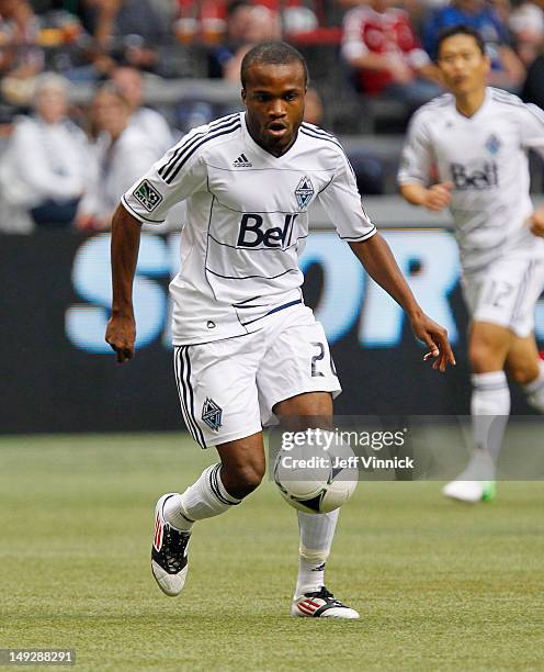 Dane Richards of the Vancouver Whitecaps FC dribbles the ball upfield during their MLS game against the San Jose Earthquakes July 22, 2012 at BC...