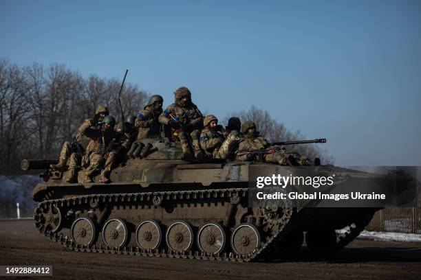 Ukrainian infantry fighting vehicle with soldiers drive on the Bakhmut direction on February 8, 2023 in Donetsk Oblast, Ukraine. After the withdrawal...