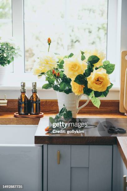 freshly cut yellow roses from the garden - floral arranging stock pictures, royalty-free photos & images