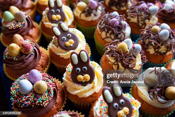 many easter cupcakes, close-up, view from above - easter baked goods stock pictures, royalty-free photos & images