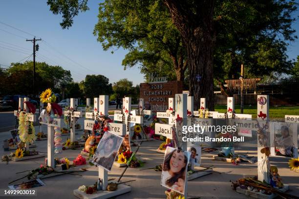 Memorial dedicated to the 19 children and two adults murdered on May 24, 2022 during the mass shooting at Robb Elementary School is seen on May 24,...
