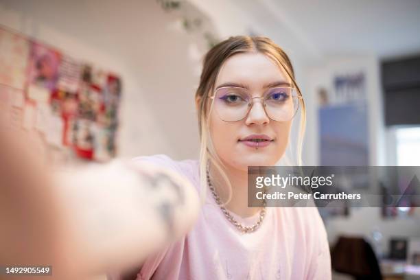 female gen z student taking a selfie - halls of residence stock pictures, royalty-free photos & images