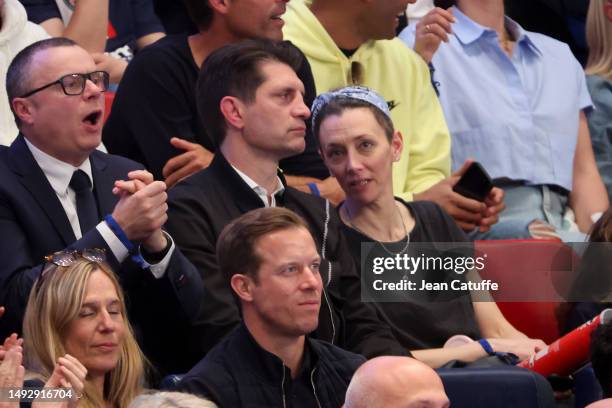 Pierre Rabadan and Laurie Delhostal attend the EHF Champions League match between Paris Saint Germain Handball and THW Kiel at Stade Pierre de...