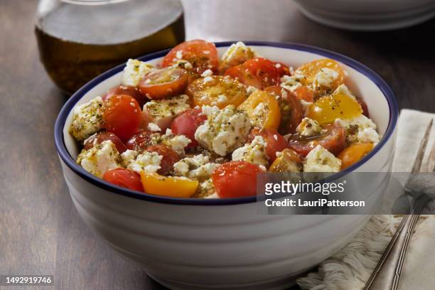 tomato and feta salad - side salad stock pictures, royalty-free photos & images