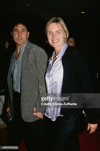 Denise Crosby and her partner attend a red carpet event, United States, 1996.