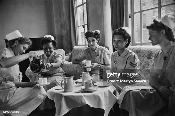 Student nurses having a tea break at Hammersmith Hospital, London, September 1947. Original publication: Picture Post - 4429 - Will The Nurse Get a...