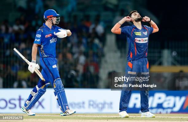 Naveen Ul Haq of Lucknow Super Giants celebrates after bowling out Cameron Green of Mumbai Indians during the IPL Eliminator match between Lucknow...