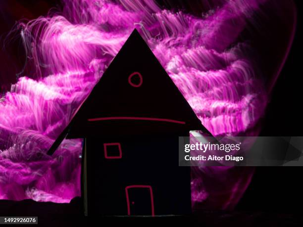 silhouette of a house hand in a dangerous and mysterious setting - space war stock pictures, royalty-free photos & images