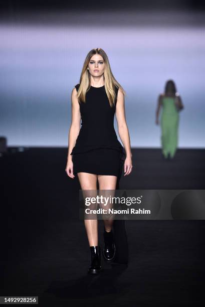 Victoria Lee walks the runway during the Cue - Presented by Afterpay show during Afterpay Australian Fashion Week 2023 at Carriageworks on May 18,...