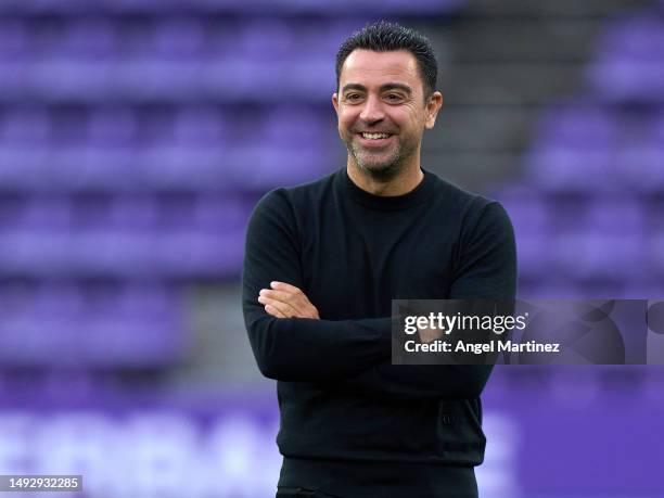 Xavi Hernandez, Head Coach of FC Barcelona looks on during a pitch inspection prior to the LaLiga Santander match between Real Valladolid CF and FC...