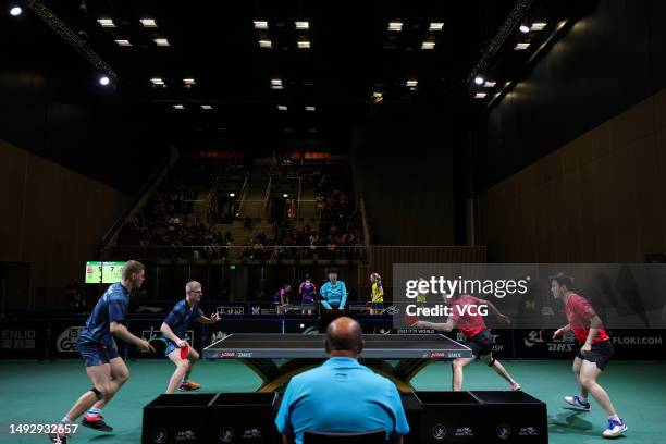 Wang Chuqin and Fan Zhendong of China compete in the Men's Doubles third round match against Alexis Lebrun and Felix Lebrun of France on day 4 of...