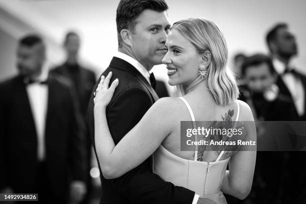 Colin Jost and Scarlett Johansson attend the "Asteroid City" red carpet during the 76th annual Cannes film festival at Palais des Festivals on May...