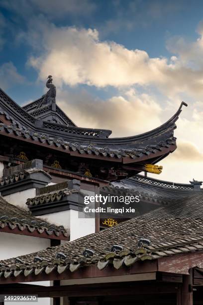 chinese-style pavilions and towers beneath white clouds. - seoul province stockfoto's en -beelden