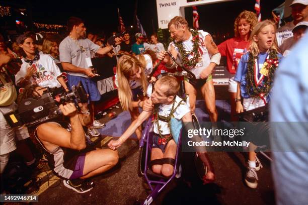 Dick Hoyt and his son Rick Hoyt, compete in the Ironman Triathlon. Rick was born in 1962 as a quadriplegic with cerebral palsy, unable to control his...