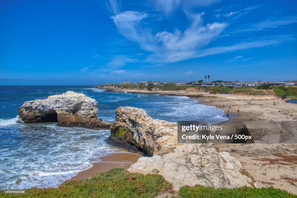 Scenic view of beach against blue sky,Santa Cruz,California,United States,USA