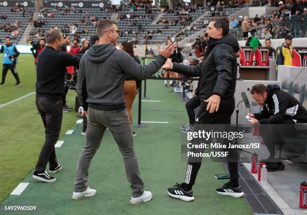 Head coach Greg Vanney of the LA Galaxy and LAFC assistant coach Ante Jazic meet during a 2023 U.S. Open Cup Round of 16 game between Los Angeles...