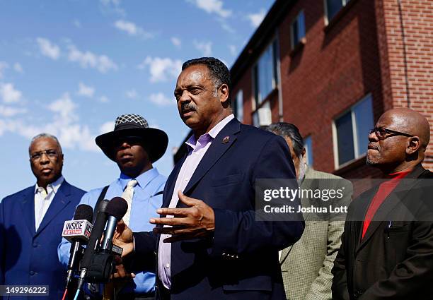 Civil rights activist Reverend Jesse Jackson speaks during a news conference outside of the apartment building where accused murderer James Holmes...