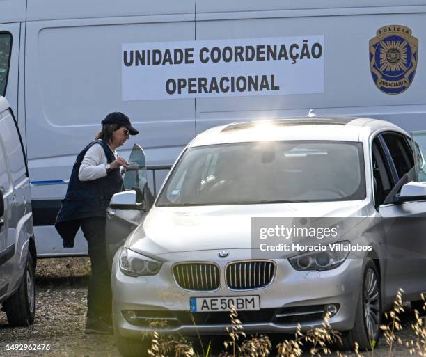 Member of Portuguese Judiciary Police stands in front of an operational vehicle in base camp at the end of a day of search for remains of Madeleine...