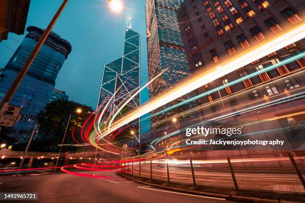 hong kong's downtown auto trails, china - light trail stock pictures, royalty-free photos & images