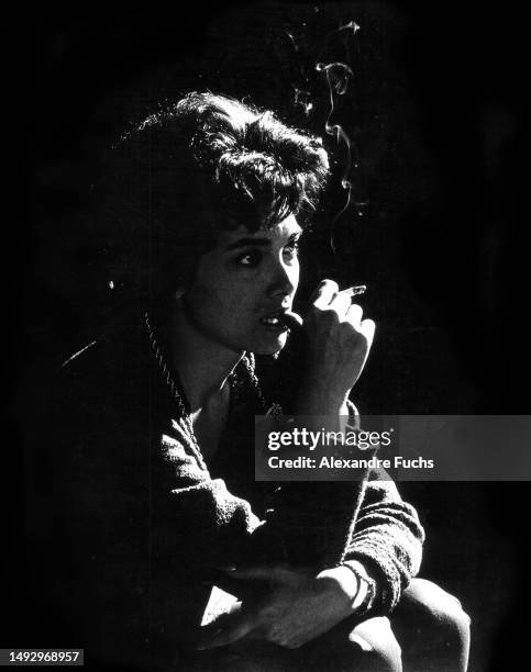 Actress Suzanne Pleshette smoking at the set of the film '40 Pounds of Trouble' at California, 1962.