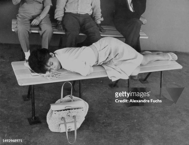 Actress Suzanne Pleshette sleeping during a break while filming '40 Pounds of Trouble' in Nevada, 1962.
