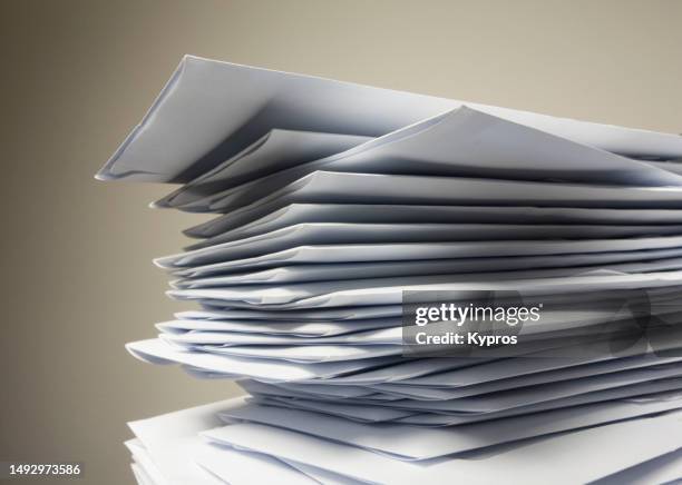 paper envelopes containing letters to be sent by post - kuvert bildbanksfoton och bilder