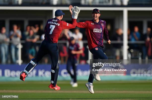 Joe Denly of Kent celebrates with Sam Billings after running out Zafar Gohar of Gloucestershire during the Vitality Blast T20 match between Kent...