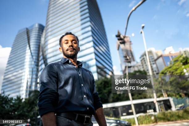 portrait of a businessman in the street - south american people stock pictures, royalty-free photos & images