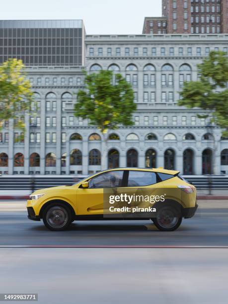 driving in the city - yellow car stock pictures, royalty-free photos & images