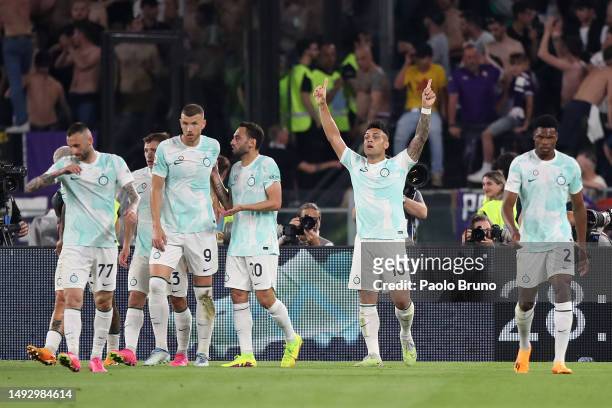 Lautaro Martinez of FC Internazionale celebrates with teammates after scoring the team's first goal during the Coppa Italia Final match between ACF...