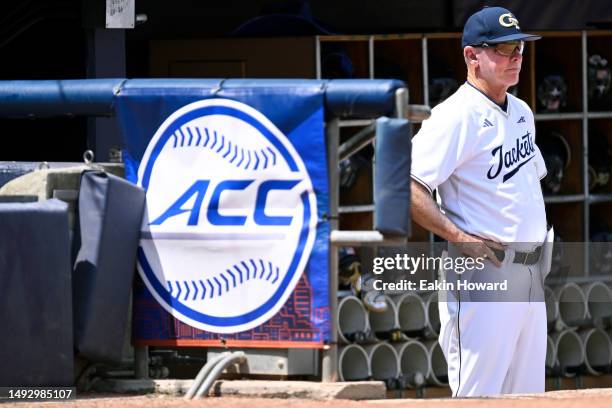 Head coach Danny Hall of the Georgia Tech Yellow Jackets stands in the dugout before their game against the Virginia Cavaliers during the ACC...