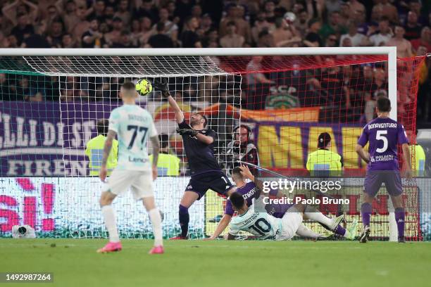 Lautaro Martinez of FC Internazionale scores the team's second goal past Pietro Terracciano of ACF Fiorentina during the Coppa Italia Final match...
