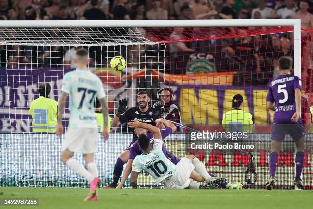 Lautaro Martinez of FC Internazionale scores the team's second goal past Pietro Terracciano of ACF Fiorentina during the Coppa Italia Final match...