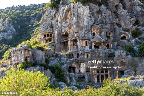 ancient tombs of the kings, in ancient lycian city of myra in demre, antalya province in turkey - paphos stockfoto's en -beelden