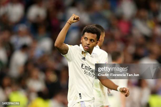 Rodrygo of Real Madrid celebrates after scoring the team's second goal during the LaLiga Santander match between Real Madrid CF and Rayo Vallecano at...