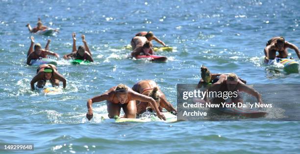 Hundreds of women from across the Northeast flocked to Sandy Hook Unit in Highlands, N.J., Wednesday to dive into the physically demanding National...