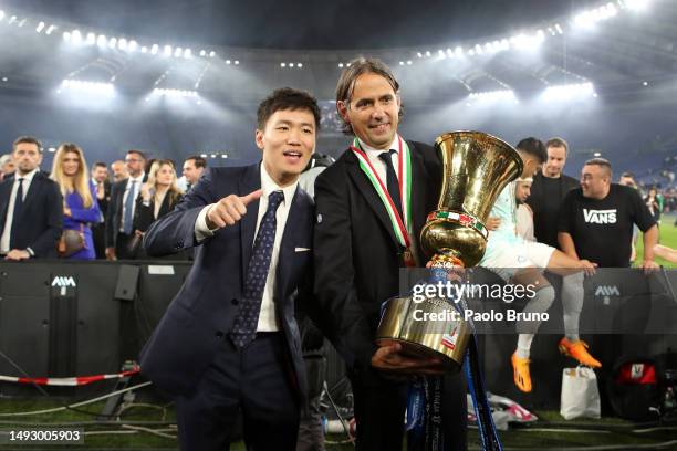 Steven Zhang, President of FC Internazionale and Simone Inzaghi, Head Coach of FC Internazionale, pose for a photograph with the Coppa Italia trophy...