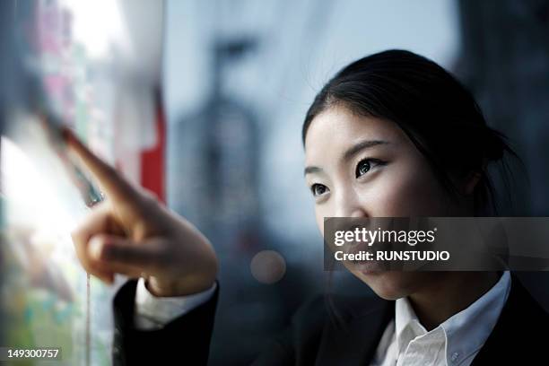 business woman buying a drink from vending machine - work vending machine stock pictures, royalty-free photos & images